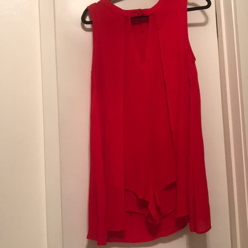 Red romper.
